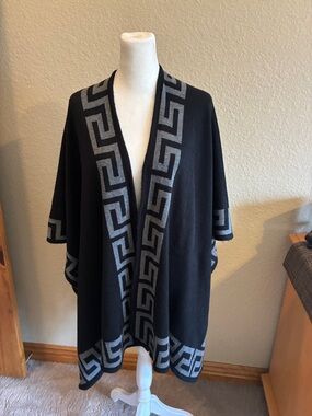 Women’s black and gray Aztec shawl.  Good condition